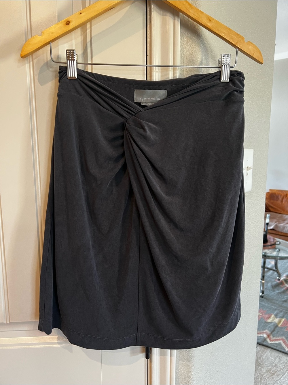 Anthropologie Black Midi Skirt with Twisted Front Detail